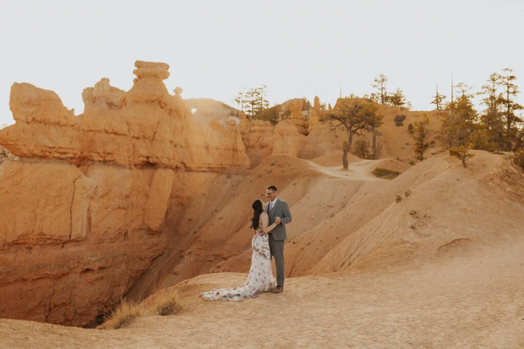 A bride and groom dancing in Bryce Canyon.